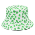 Detailed macro view of green marijuana leaf print on white canvas bucket hat fabric - White With Green Leaves