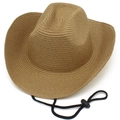Detailed close-up of brown straw cowboy hat with adjustable windproof cord and woven texture - One Size / Camel
