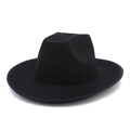 Detail view of the black wool felt fedora hat featuring a wide brim and classic pinched crown - Black