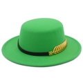 Close-up of bright green felt boater hat featuring a black ribbon and gold leaf ornament - Emerald Green