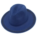 Close-up of deep blue woven sun hat with decorative wave pattern trim on brim - Blue