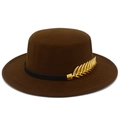Detail of coffee brown boater hat featuring a black leather band and golden wheat buckle - Coffee