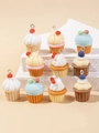 Colorful resin cupcake charms for DIY jewelry making displayed on a stone platform - Mixed Cupcake Colors