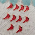 Close-up of 10 red cardinal bird charms with gold plated edges for DIY jewelry making - Red Bird