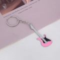 Miniature pink and black electric guitar keychain made of alloy metal with glossy finish - Pink Guitar Keychain