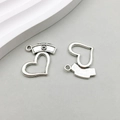 Macro detail of antique silver alloy heart pendants with nurse hat design for DIY jewelry - Heart Nurse Hat (10443) / 17*20mm