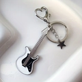 Subculture guitar keychain with heart clasp and star charm in silver and black enamel - White