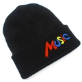 Detail of colorful MUSIC embroidery on a black knitted beanie with high texture detail - Black