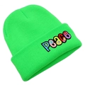 Detailed texture of neon green beanie with colorful Peace letter embroidery and floral detail - Green
