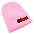 Detail of light pink knitted beanie featuring a red embroidered OMG! patch on the cuff - Pink