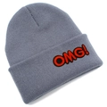 Close-up of grey knit beanie featuring red OMG! embroidered letter patch on the cuff - Gray