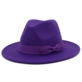 Close-up of purple wool fedora hat featuring a matching silk ribbon and bow detail - Purple