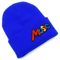 Detailed close-up of rainbow MUSIC embroidery on a bright royal blue knit beanie hat - Sapphire Blue