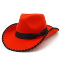 Detail of red cowboy hat with black silk ribbon bow and unique wavy stitched edge - Red