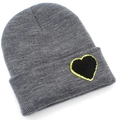Detail view of grey ribbed knit beanie featuring a black and gold glitter heart patch - One Size / Marl Grey