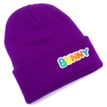 Detailed close-up of dark purple knit beanie featuring a colorful BUNNY patch embroidery - Purple