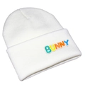 Detail of white knit beanie with colorful BUNNY embroidered letters on the cuff - White