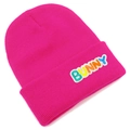 Close-up of vibrant rose pink beanie with colorful Bunny letter patches and knit texture - Rose Red