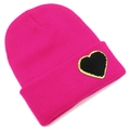 Detail of rose pink ribbed knit beanie featuring a black heart patch with gold sequins - One Size / Rose Red