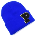 Detail of royal blue knit beanie with a black letter P patch and gold glitter border - Sapphire Blue