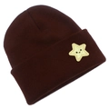 Detail of dark brown knitted beanie with yellow star smiley face patch on a white background - Coffee