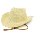 Detailed texture of hand-woven straw cowboy hat with a brown drawstring and wooden toggle - Beige