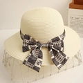 Elegant cream straw sun hat with bow tie and letter print for summer beach outings - Beige
