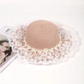 Summer woven straw sun hat with daisy accents and wide lace brim for elegant beach wear - One Size / Pink