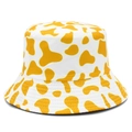 Unisex cotton bucket hat with yellow cow print pattern for summer sun protection - Yellow White Cow Print