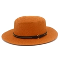 Detail of orange woven straw sun hat with leather belt and golden metal buckle - Caramel color