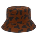 Detail showing the brown cow print bucket hat with reinforced parallel brim stitching - Brown and Black Cow Print