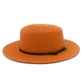 Detail of orange woven straw boater hat with brown leather band and gold metal rivet - Caramel color