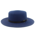 Detail of navy blue straw boater hat featuring gold stud band and metal ring accent - Dark Blue