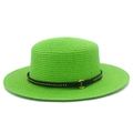 Detail of bright green straw hat featuring black leather band with golden metal rivets - Verdant