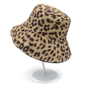 Detailed view of fashionable leopard print bucket hat on a display stand for summer sun protection - One Size / Khaki