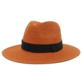 Detail of hand-woven straw sun hat showing natural texture and black ribbon band - One Size / Caramel color