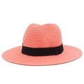 Detail of coral pink straw sun hat showing high-quality woven texture and black ribbon - One Size / Pink