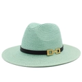 Dettaglio della trama in paglia verde menta e della fibbia dorata sul cappello da sole - Verde Menta