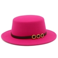 Close-up of rose red flat top hat with dark band and diamond-encrusted gold buckles - Rose Red