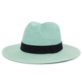 Close-up of mint green straw fedora hat featuring woven texture and black ribbon detail - One Size / Mint Green