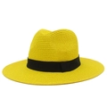 Detail of yellow woven straw sun hat with fine texture and black ribbon band - One Size / Yellow