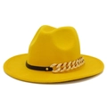 Detail of bright yellow wool fedora hat featuring a gold chain and black decorative band - Yellow