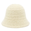 Close-up of thick knit cream bucket hat showing detailed 3D woven texture and warm yarn - One Size / Beige
