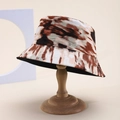 Double-sided tie-dye bucket hat with abstract marble print on a wooden display stand - One Size / Brown Beige Tie-Dye