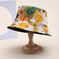 Dettaglio del cappello pescatore con vivace stampa floreale stile pittura a olio su legno - Floreale giallo