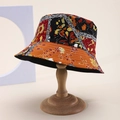 Detailed view of bucket hat stitching with colorful ethnic floral and geometric patterns - Multicolor Ethnic Style Patchwork Print (68)