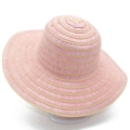 Close-up detail of the pink and beige striped woven texture on wide brim sun hat - One Size / Pink