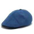 Retro denim newsboy cap with black leather brim in a minimalist patchwork design - One Size / Blue