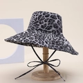 Detailed view of leopard print sun hat with stylish chin strap on a wooden stand - Gray Leopard Print Style (8#)
