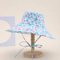 Close-up of a floral print cotton bucket hat with a wide brim and matching chin strap - White Blue Pink Floral Style (28#)